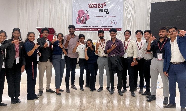 Student volunteers assisting physically challenged candidates at the Job Habba job fair.