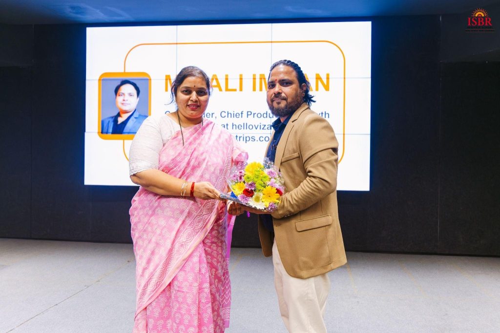 Startup pitch presentation with alumni judge interaction at business school event