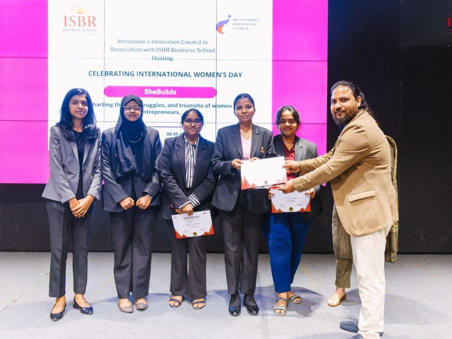ISBR alumnus mentoring students at Genesis Pitch Competition 2025