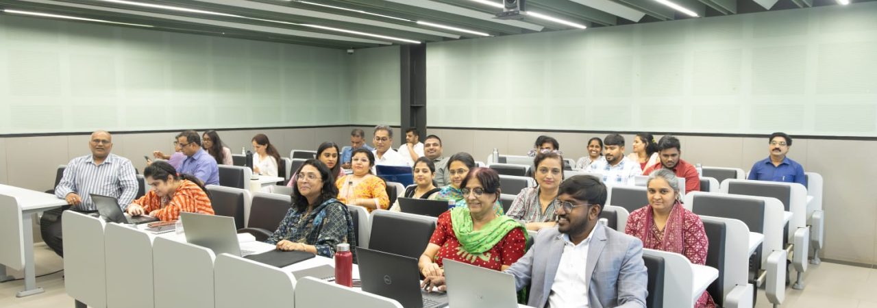 Management educators learning ChatGPT, Gemini, and AI tools during a faculty development programme