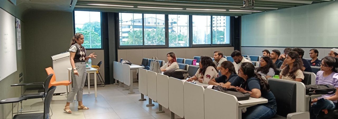 MBA students attending an Alumni Industry Connect session on career options in business analytics with cybersecurity business analyst speaker.